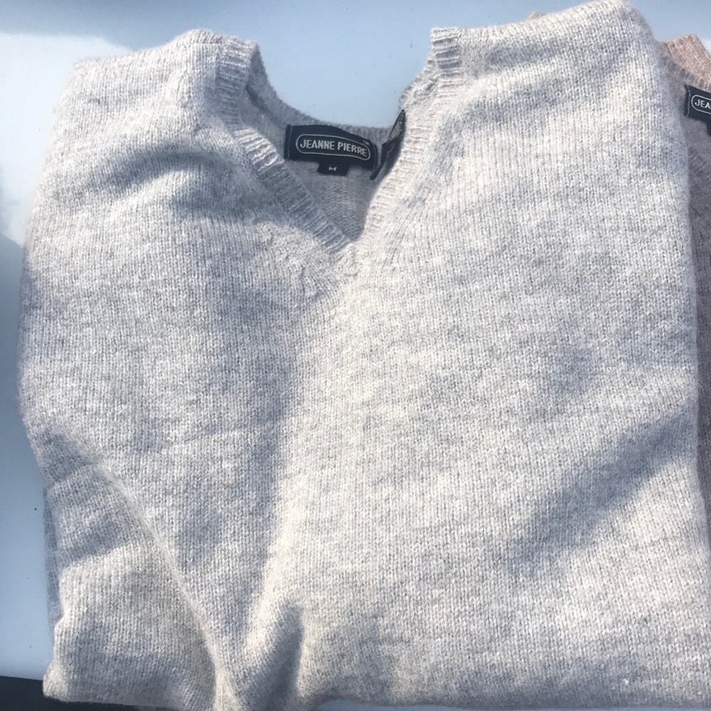 TWO V-neck sweaters